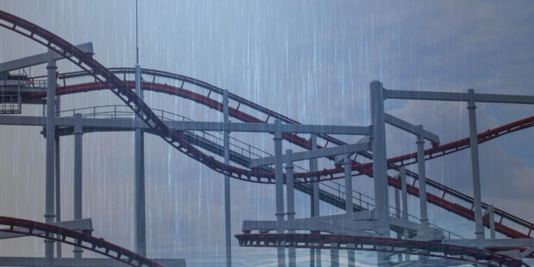 Rain-filled view of a roller coaster as a visual for the grief roller coaster