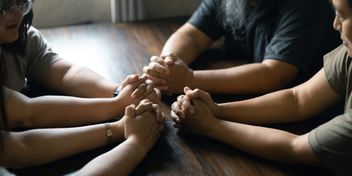 Small group praying